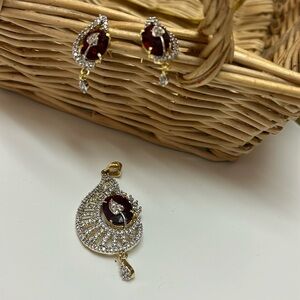 Indian jewlry earrings and pendant set. Indian Gold red stones. Pre owned